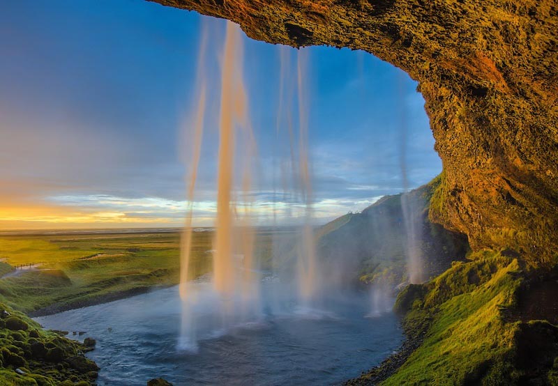 Wasserfall aus einer Höhle Fototapete wallpaper mural