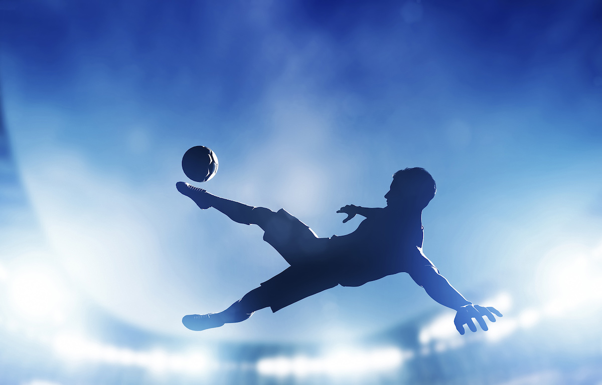 Fußballspieler beim Torschuss Tapete | 3DFototapete